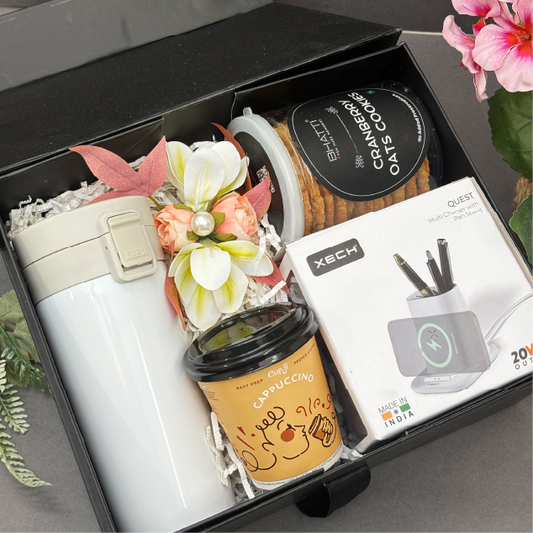 Gift set with thermos, coffee cups, and stationery items in a box.