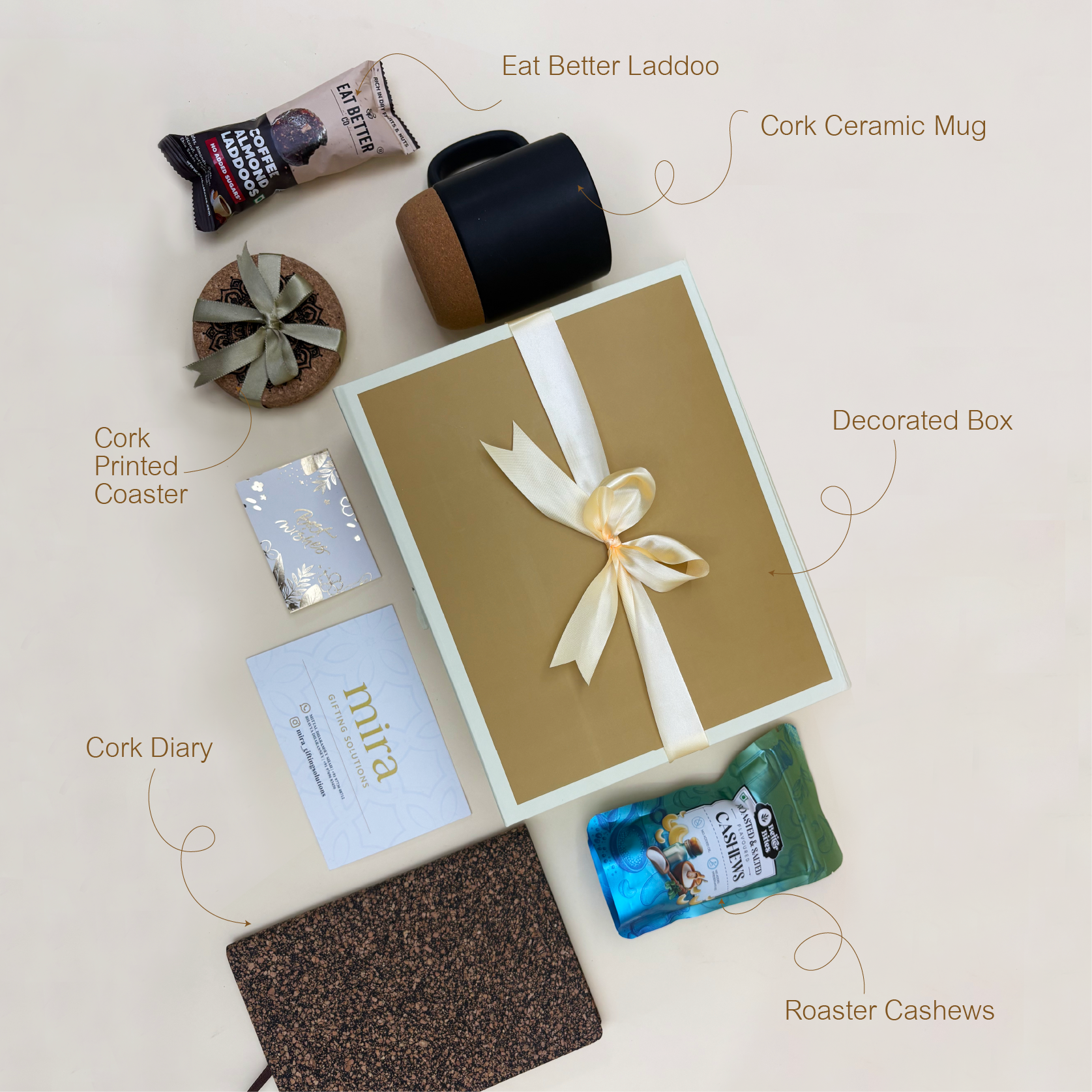 Collection of cork products including a mug, coaster, diary, and cashews on a light background.
