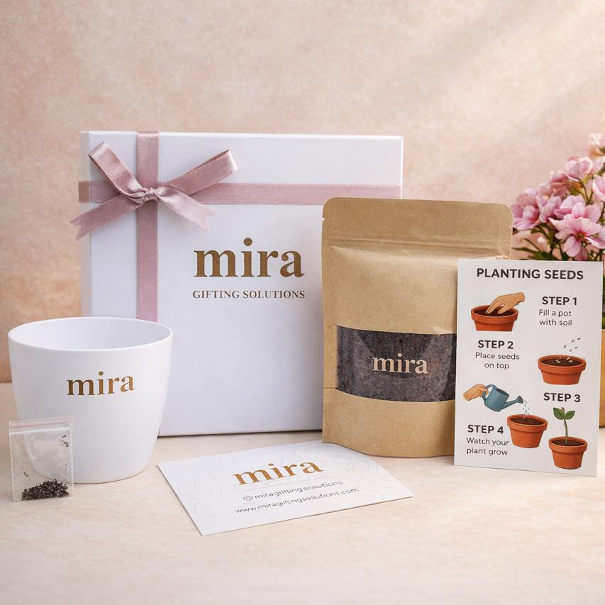 Mira gifting solutions products including a mug, gift box, and seed packet on a light background.
