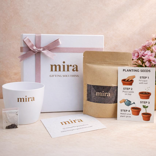 Mira gifting solutions products including a mug, gift box, and seed packet on a light background.