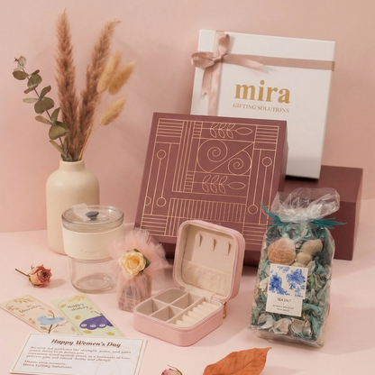 Gifting set with 'mira' products on a pink background