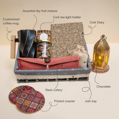 Collection of home decor and lifestyle items including a coffee mug, tea light holder, cork diary, chocolate, printed coaster, and jute tray on a beige background.